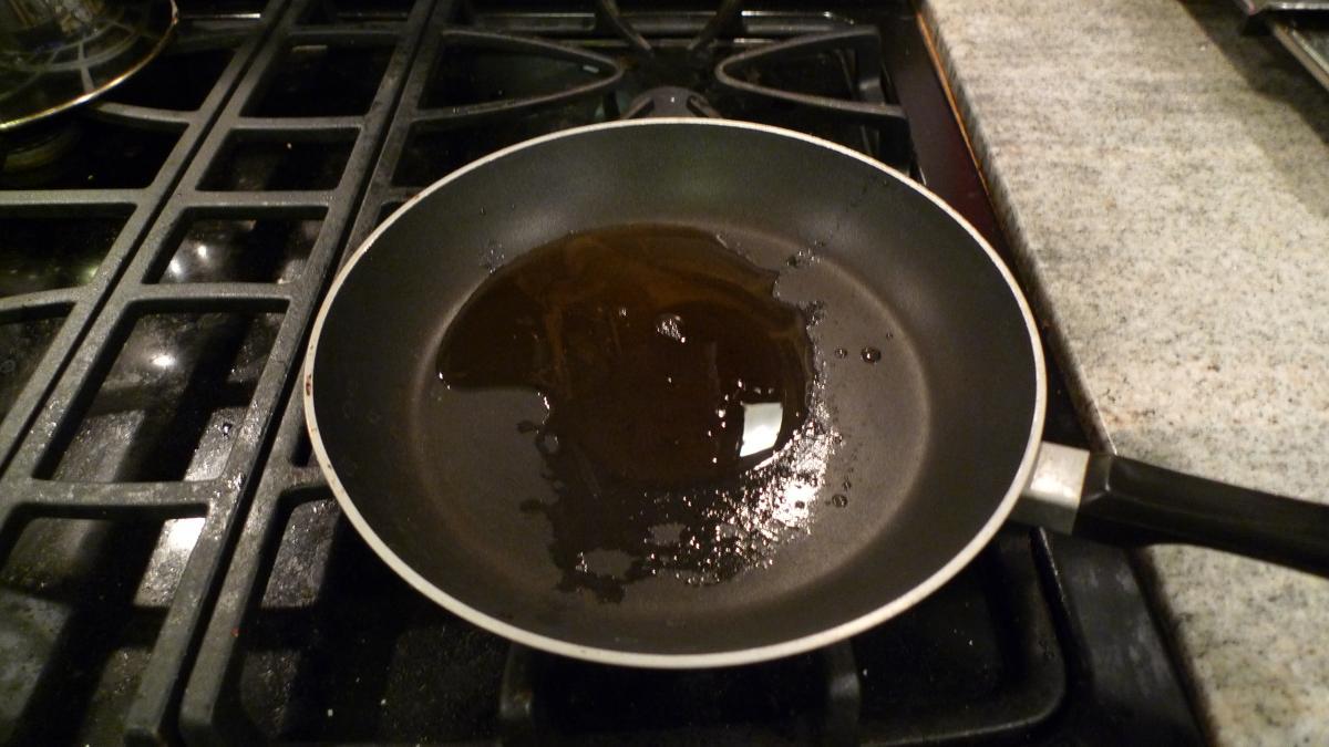 Three spoons of seame oil in hot frying pan (use Wok if availabe, to avoid splatter - it took a while for me to clean up with my shallow pan!)