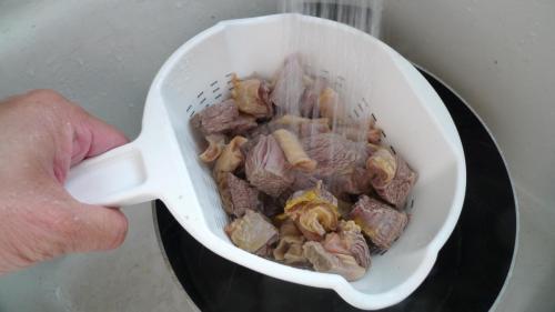 pour everything into a colander and rinse off any extra dirty chunks from the meat pieces